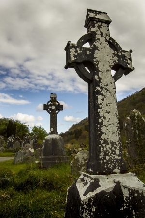 Two celtis cross located on local graveyard in Wicklow National Parkの写真素材
