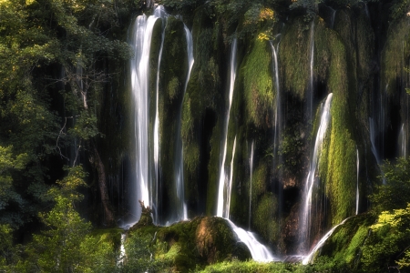 Waterfall located in middle of forrest of Plitvice National Parkの写真素材