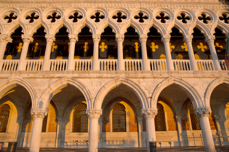 View of famous Dodge Palace  in perfect sunrise light which is creating  yellow shadow pattern, Venice Italyのeditorial素材