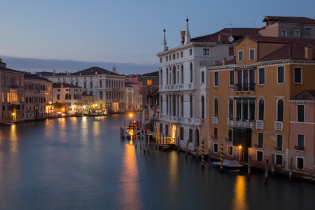 Blue light picture of Canal Grande in Venice with light reflection in waterの写真素材