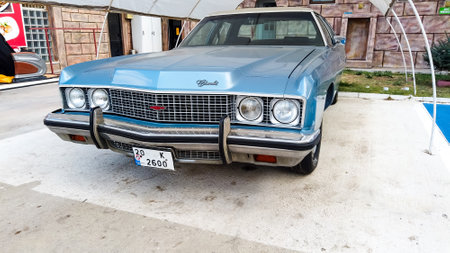 Side view of a blue Cadillac Eldorado under the canopy. careful storage of a vintage car. car show outdoor. car restoration. Turkey - September 10, 2021のeditorial素材