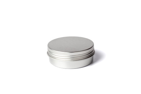 Metal jar of cream isolated on white background. Aluminum pot for natural cosmetic product. Skin care. Cream containerの写真素材
