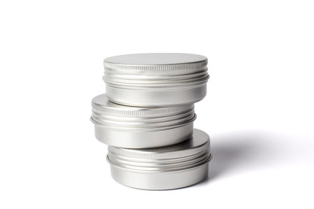 Three metal jar of cream isolated on white background. Aluminum pot for natural cosmetic product. Skin care. Cream containerの写真素材