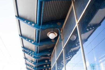 Selective focused steel beams, metal pillar, girder supported underneath metal sheet roof. Concept...