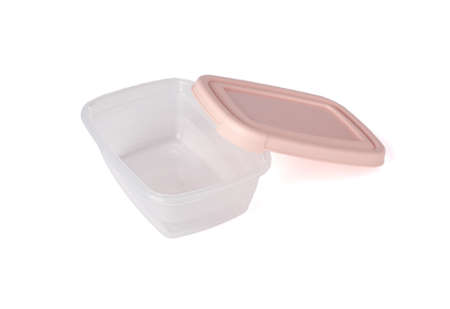Open plastic food storage container with pink lid isolated on white background. Food box for lunch. Close upの写真素材
