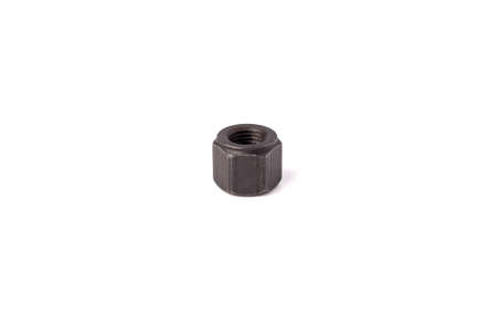 One macro metallic nut isolated on white background. Heavy hex nut. Female screw nut with copy space. Fastenerの写真素材