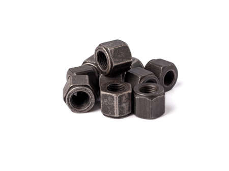 bunch of metallic nuts isolated on white background. Heavy hex nut. Female screw nut with copy space. Fastenerの写真素材