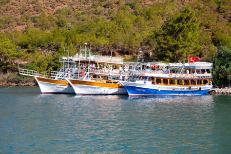 Anchored excursion pleasure boats waiting for tourist for sea trip to Aegian islands. Turkey, Marmaris - September 9, 2021のeditorial素材