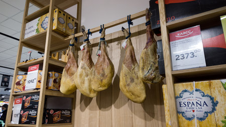Traditional Spanish jamon ham for sale at the market. Kharkiv, Ukraine - January 14, 2022のeditorial素材