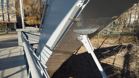 Steel beam of pedestrian bridge with steel cable. Girder bridge close up.の写真素材