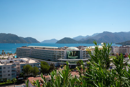 Cityscape of resort town Marmaris in Mugla province, Turkey. Tourist town on the sea coast surrounded by mountains. Observation deck view. Marmaris, Turkey - September 5. 2021のeditorial素材