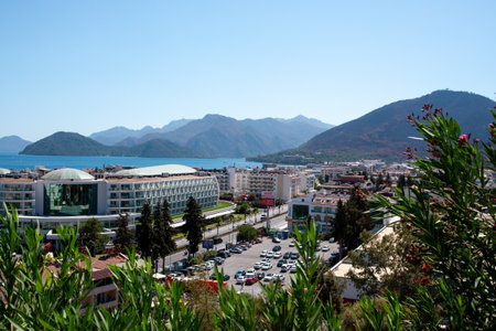 Cityscape of resort town Marmaris in Mugla province, Turkey. Tourist town on the sea coast surrounded by mountains. Observation deck view. Marmaris, Turkey - September 5. 2021のeditorial素材