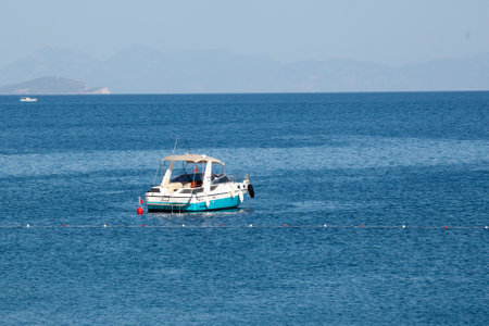 White Boat Moored In sea bay, Fishing boat. Turkey, Turunc, Marmaris - September 10, 2021のeditorial素材