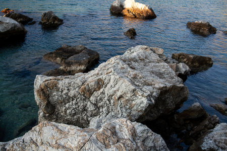 Rocks and stones in the sea. sea stones. Rough stone surface texture.の写真素材