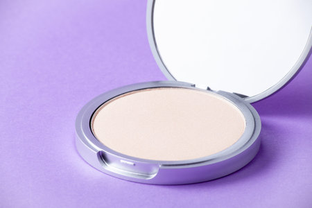 Eye shadow palette on purple background in macro. makeup product.の写真素材
