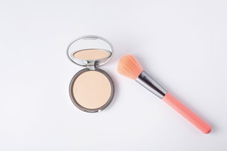 Beautiful eyeshadow palette with makeup brush lie on the table top view. makeup product.の写真素材