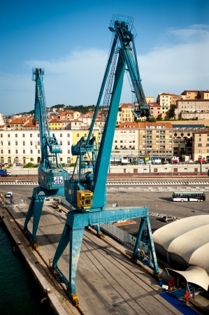 ANCONA, ITALY - MAY 3: Huge crane in Ancona Port, Italy, on May 3, 2013. Since the beginning of recession, the annual traffic slightly falls - in 2012 to abou 8 millions tons.のeditorial素材