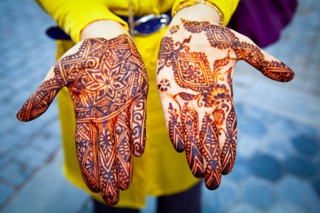 Hands painted with henna close upの写真素材