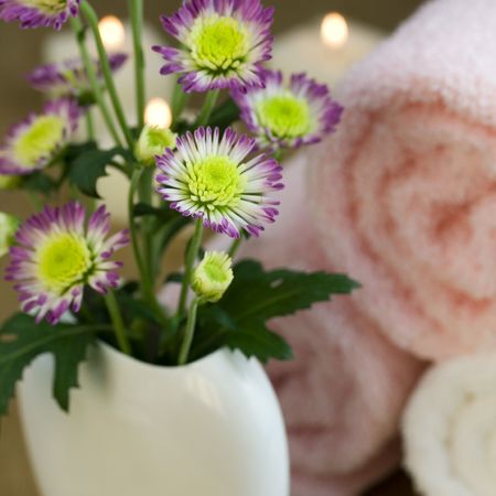 Flowers,  towel and candles. Time to relax.の写真素材