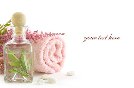 Jar with fresh leaves and towel (SPA concept) (with sample text)の写真素材