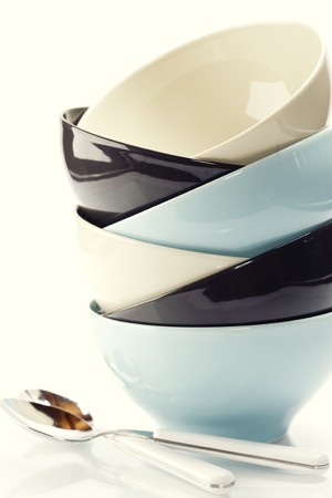 Stack of bowls and spoonsの写真素材