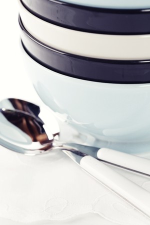 Stack of bowls and spoonsの写真素材
