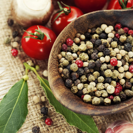 Fresh herbs and spices (tomatoe, garlic, pepper, mushroom, bay leaves)
