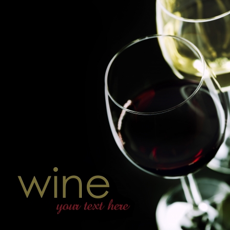 Glasses of  wine on black background  (easy removable sample text)の写真素材