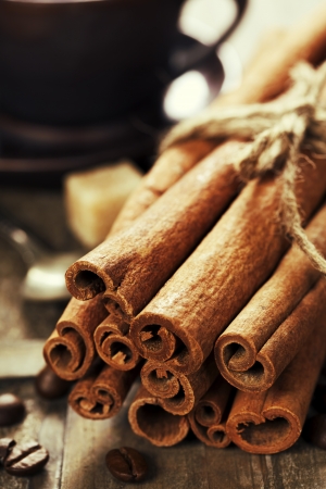cinnamon, coffee and spices on wooden tableの写真素材