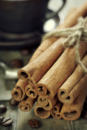 cinnamon, coffee and spices on wooden tableの写真素材