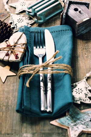 Christmas table place setting with christmas decorationsの写真素材