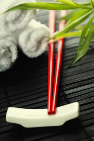 Chopsticks and towels - oriental style table serving の写真素材