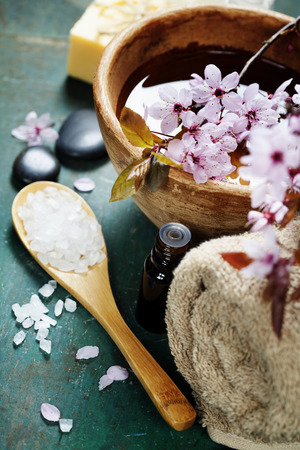 Spa setting on old  wooden boardの写真素材