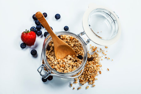 Healthy breakfast - muesli and berries - health and diet concept