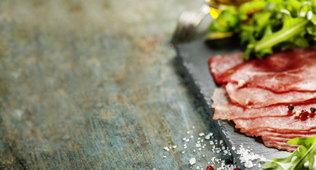 Beef Carpaccio on dark backgroundの写真素材