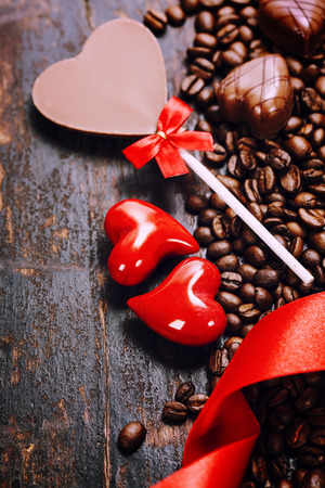 Coffee and chocolate  on grunge wooden background - Valentine's day and love conceptの写真素材
