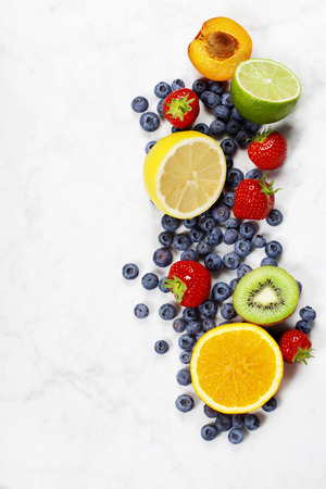 Fruits on Marble Background. Summer or Spring Organic Fruits. Agriculture, Gardening, Harvest Conceptの写真素材