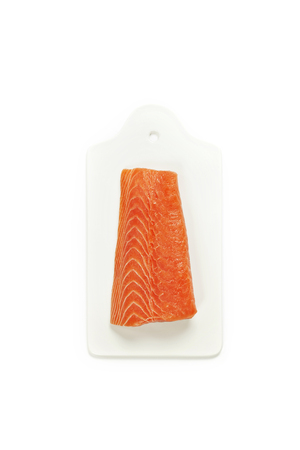 fresh raw salmon fillet on white backgroundの写真素材