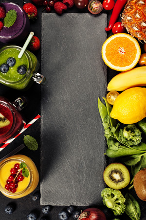 Fresh smoothies and ingredients on rustic backgroundの写真素材
