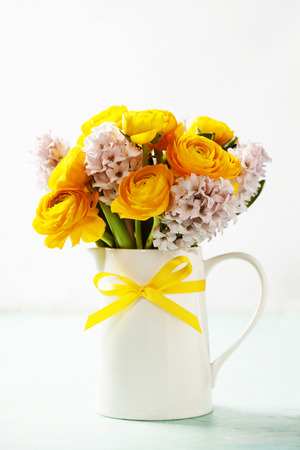 Beautiful spring flowers in vaseの写真素材