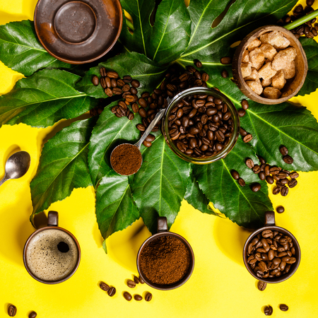 Coffee composition on yellow backgroundの写真素材