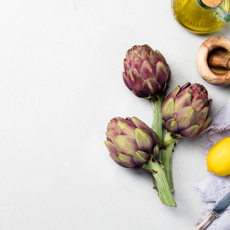 Artichokes on grey concrete backgroundの写真素材