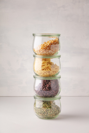 glass jars with pasta, lentils, beans and corn. Zero waste, Recycling, Sustainable lifestyle conceptの写真素材