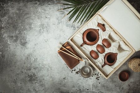 Tea set in the box on concrete background, flat lay, copy spaceの写真素材