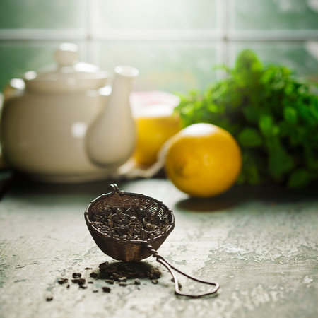 Tea composition on wooden table, close up