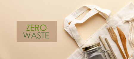 Cotton bag, bamboo cultery, glass jar, bamboo toothbrushes, hairbrush and straws on color background, flat lay.の写真素材