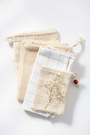 Reusable shopping bags on white background. Zero waste concept.の写真素材