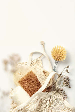 Zero waste kitchen cleaning concept. Eco friendly natural cleaning tools and reusable shopping bag, top view, copy spaceの写真素材