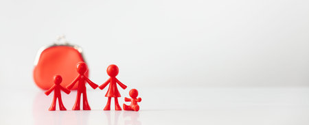 Miniature plastic figures family with children , and Red Coin Purse on light gray background with copy space. Money, saving planing, financial, insurance, business growth and family conceptの写真素材