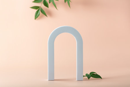 Cosmetic art deco arch display in pastel color for product presentationの写真素材
